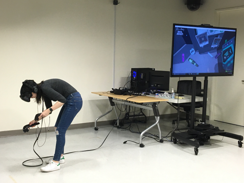 The author, desperately trying to pick up objects while playing Rick and Morty: Virtual Rick-ality